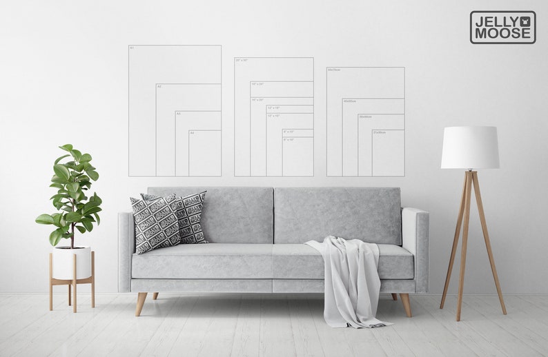 May include: A white wall with a gray couch and a floor lamp. There are three sets of framed prints on the wall, each with different sizes. The prints are labeled with measurements in inches. The text "JELLY MOOSE" is in the upper right corner of the image.