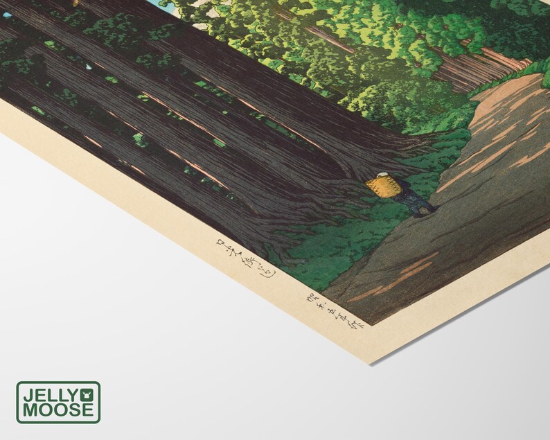 May include: A woodblock print depicting a path through a dense forest of tall trees. The path leads to a clearing where a person with a basket is walking. The print is in shades of green, brown, and blue.