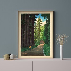 May include: A woodblock print depicting a path through a forest of tall trees. The path is lined with trees on both sides, and a single figure walks down the path. The sky is blue with white clouds.