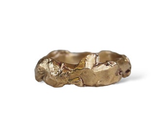 Small hand-carved freeform rings in silver or bronze, the “Thalia” ring