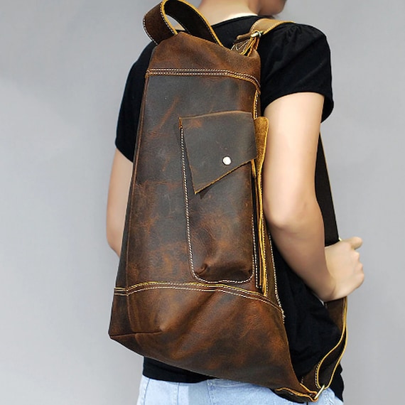 leather sling pack