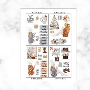 May include: A sheet of planner stickers with a winter theme. The stickers include illustrations of a Christmas tree, gifts, mugs, and people. Text includes "It's the most wonderful time of the year" and "Baby it's cold outside."