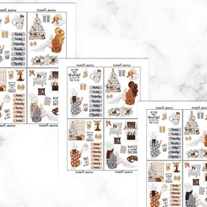 May include: Sheets of planner stickers with a winter theme. The stickers feature illustrations of Christmas trees, mugs, gifts, and cozy figures. Text includes "It's the most wonderful time of the year" and days of the week.