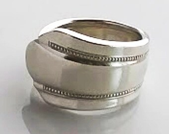 1238 / Pierścień ze srebrną łyżką - Olympia 1932.