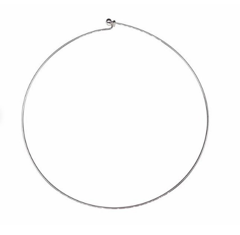 1098 Silver Spoon Whale Tail Necklace.