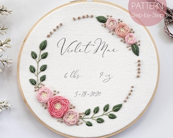May include: Embroidered hoop art with pink flowers and greenery, featuring the name "Violet Mae", birth weight of 6 lbs and 7 oz, and birthdate 3-18-2020.