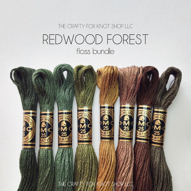 May include: A bundle of six DMC embroidery floss spools in shades of green, brown, and gold. The spools are labeled "DMC Special" and "25" with the text "The Crafty Fox Knot Shop LLC" at the bottom of the image.