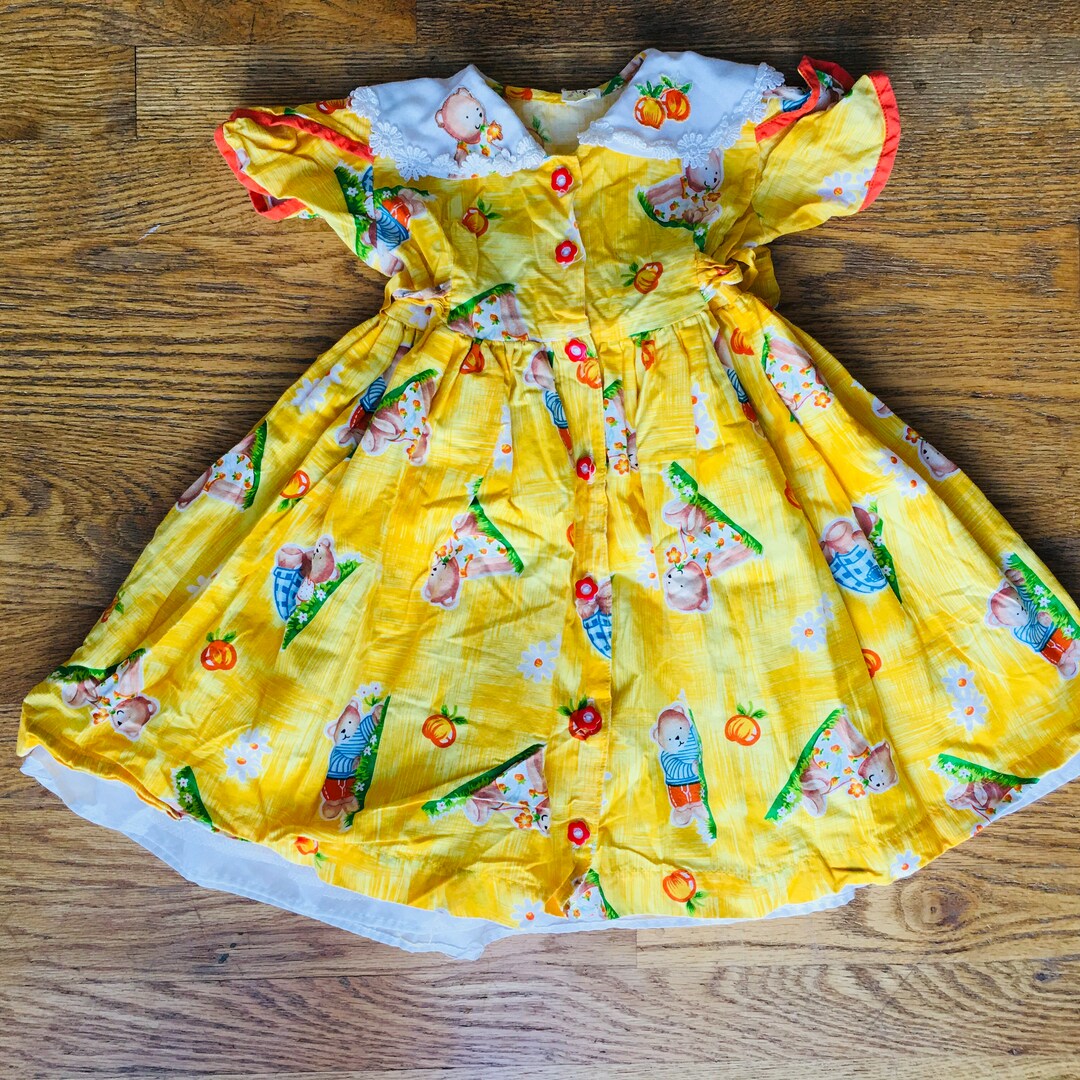 Teddy Bear Printed Dress For Baby Boy In Yellow Color