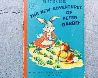 Libro d'azione vintage con copertina rigida La nuova avventura di Peter Rabbit