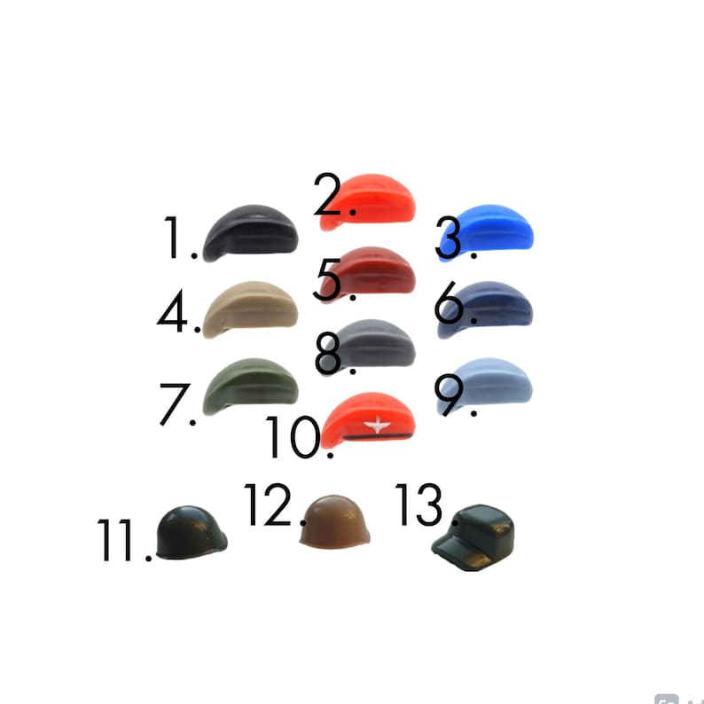 May include: A selection of miniature hats in a range of colours, such as black, red, blue, beige, grey, and green. Some are berets, others are baseball caps or military-style hats. The hats are displayed against a white backdrop.