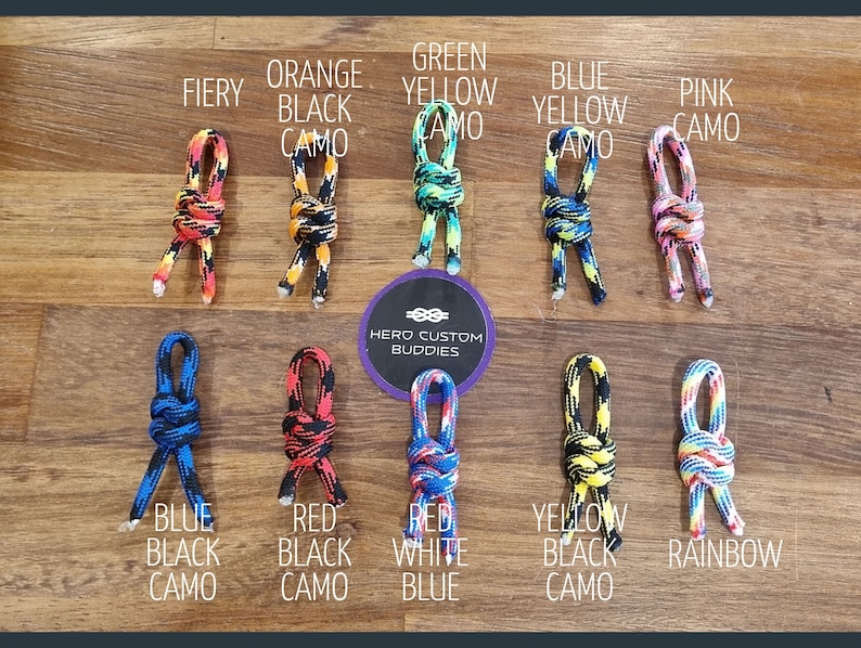 May include: Ten different color combinations of paracord dog toys. The toys are made with a knot that resembles a figure eight. The colors include fiery, orange black camo, green yellow camo, blue yellow camo, pink camo, blue black camo, red black camo, red white blue, yellow black camo, and rainbow.