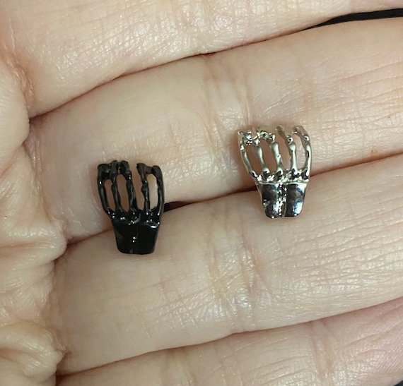 Skeleton hand lip best sale ring