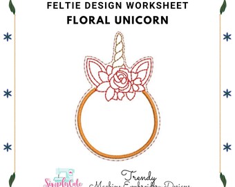 May include: A felt applique design worksheet for a floral unicorn. The design features a red rose with green leaves, a gold horn, and a gold circle.