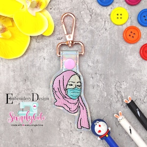 Girl wearing Face Mask Snap Tab , Embroidery Digital File Instant Download key fob, machine embroidery design, in the hoop