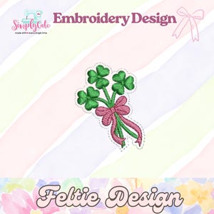 May include: An embroidery design featuring a bouquet of green shamrocks tied with a pink bow. The design is on a colorful striped background with the text "Embroidery Design" and "Feltie Design". The logo "Simply Cute" is also visible.