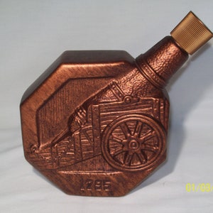 Vintage 1970 Jim Beam Bronce 1795 Botella decantador de licor Jim Beam en forma de cañón