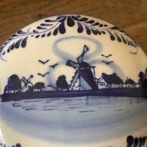 Beautiful vintage round blue delfts glazed ceramic barrel butter dish with lid decorated with a hand painted blue dutch scene image 10