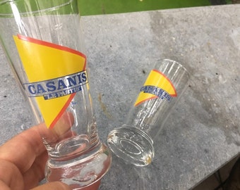 2 vintage Casanis "Le Pastis" glasses, with heavy glass base.