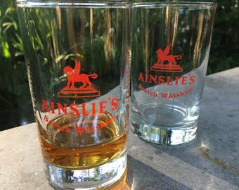 2 vintage Ainslie's scotch whisky glasses