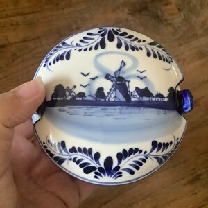 Beautiful vintage round blue delfts glazed ceramic barrel butter dish with lid decorated with a hand painted blue dutch scene image 7