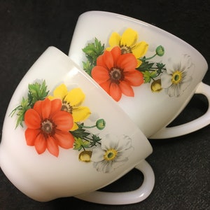 2 vintage arcopal tea or coffee cups with an image of  wild flowers