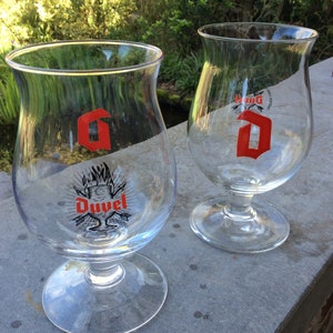 Two vintage Duvel glasses from the Moortgat brewery, with the red D logo. Duvel, tulip glass, Belgian beer, Belgium