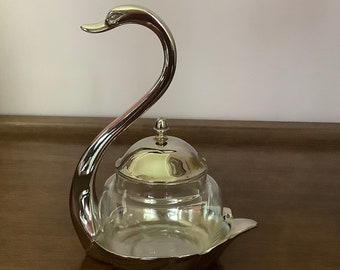 Beautiful elegant silver-plated swan that watches over your tasty jams, sugar or other delicacies.