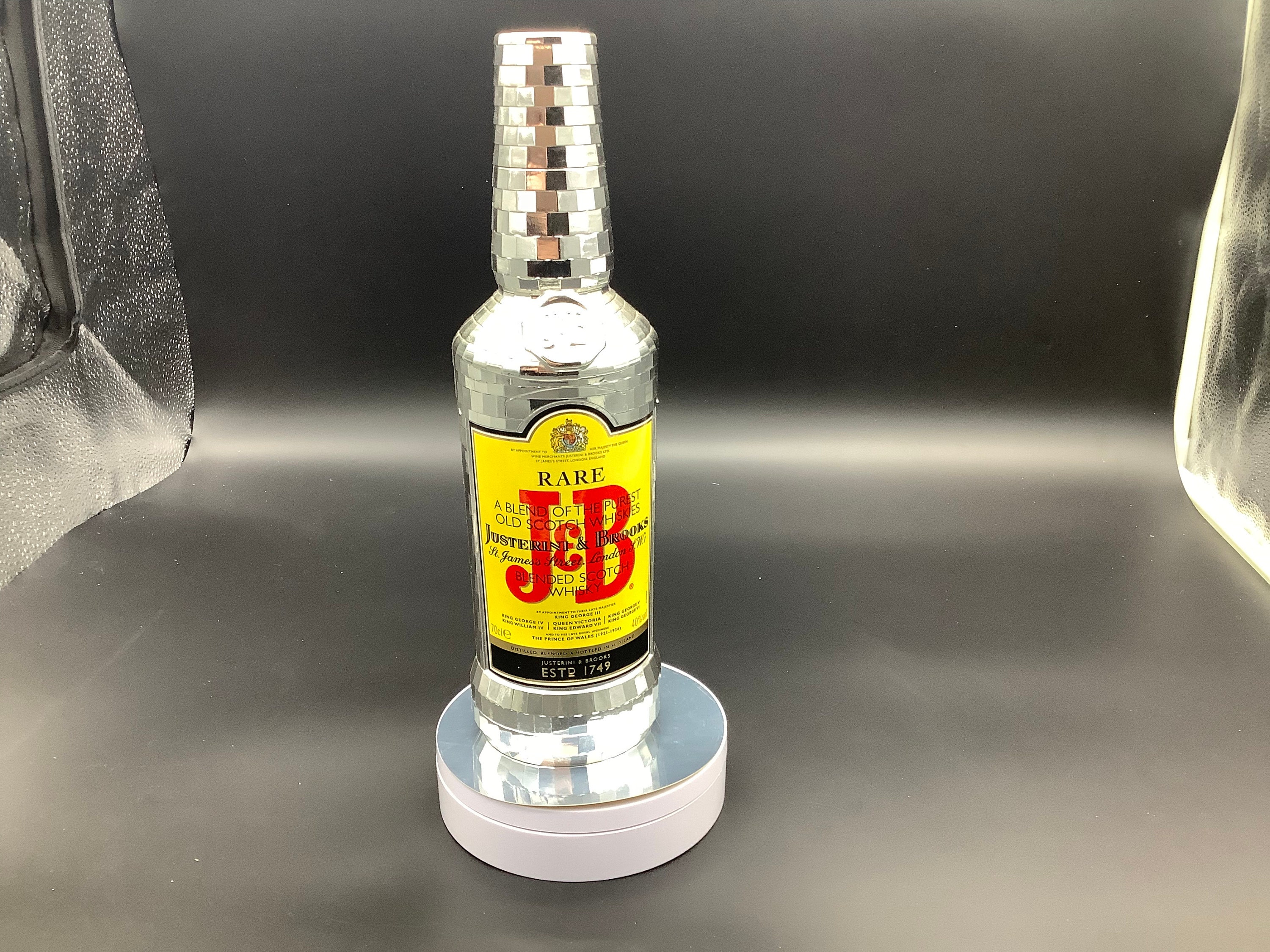 A Flashy Disco Sleeve for a J&B Whiskey Bottle 