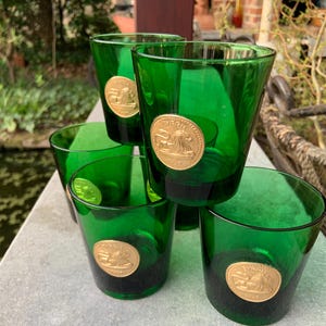6 green vintage Byhrr glasses with 6 gold-plated medallions depicting the lion