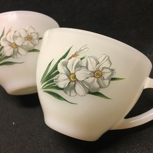 2 vintage arcopal tea or coffee cups with an image of daffodils flowers