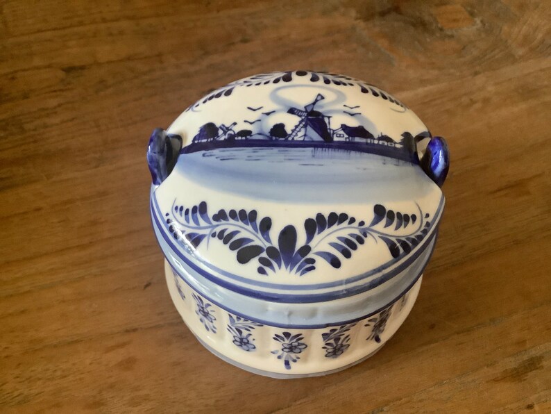 Beautiful vintage round blue delfts glazed ceramic barrel butter dish with lid decorated with a hand painted blue dutch scene image 3