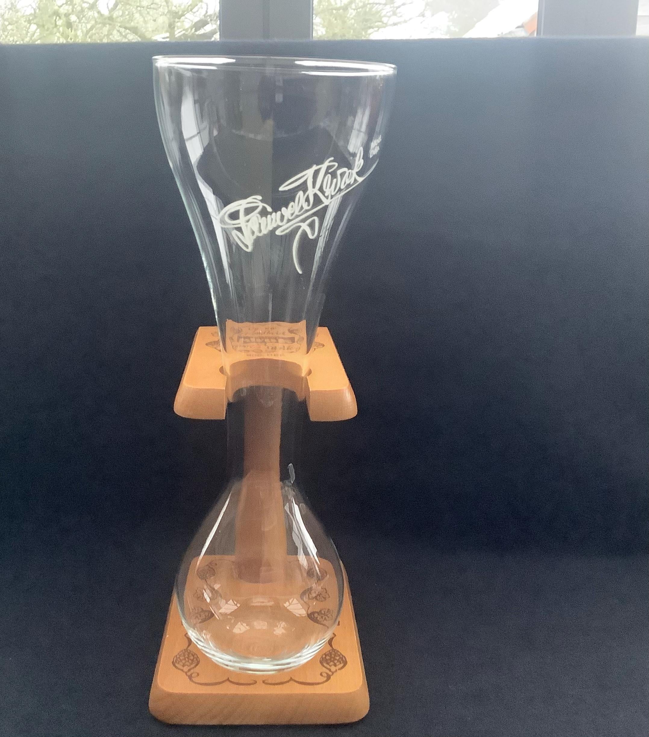 Kwak glass or coachman's glass in wooden holder from the Belgian Pauwels brewery