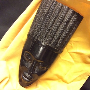 A very heavy African ebony wood sculpted mask, head, hanging wall sculpture, 1960&#39;s Vintage African Ebony Wood Hand Carved Mask