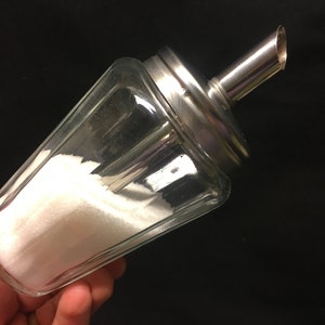 A vintage retro sugar dispenser / shaker and honey or creamer dispenser Design, made by BMF
