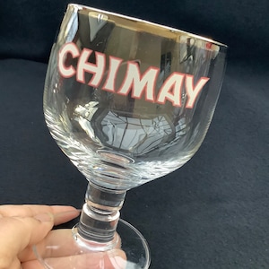 2 different glasses for the famous Trappist beer Chimay, chalice-shaped glass on a heavy foot.