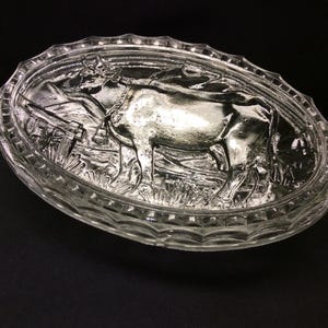 Cute vintage French cow  butter dish in little terrine or trinket box made of molded glass, It features a standing cow in relief on the lid