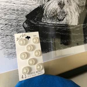Vintage Le Chic White Plastic Four-Hole Buttons