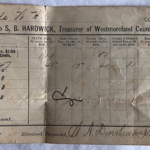 May include: A vintage tax receipt from 1897 for Mr. Beale N.H. in the Cople District of Westmoreland County, Virginia. The receipt shows a total amount of $3.36 for taxes.