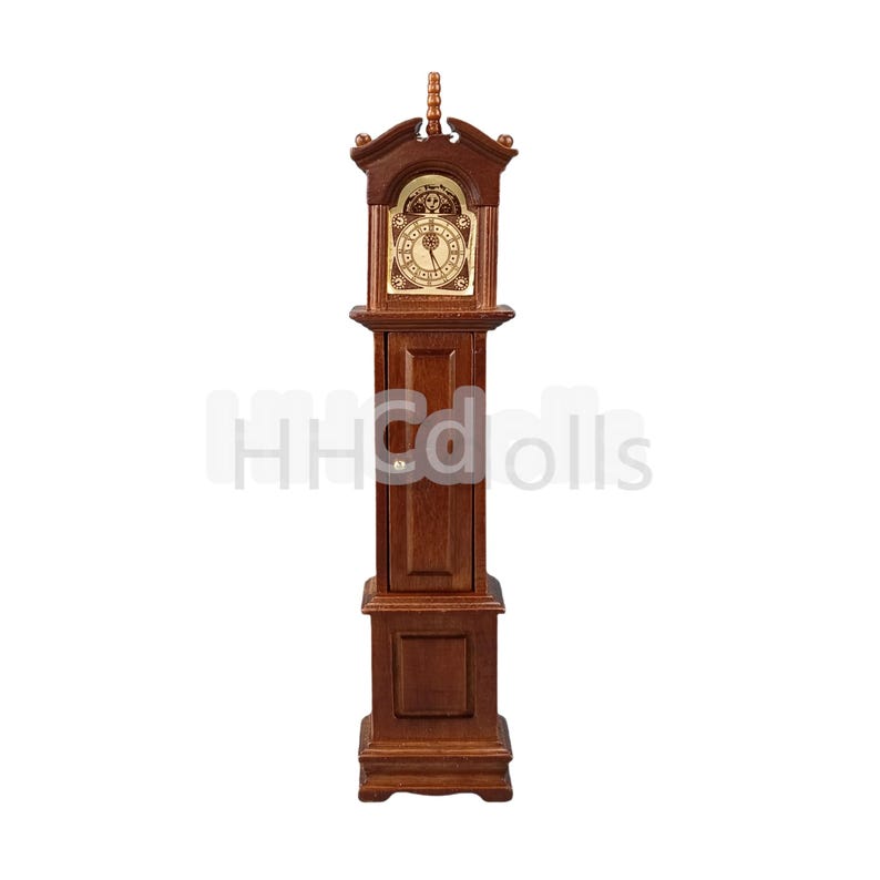 May include: A wooden grandfather clock with a brown finish. The clock has a white face with black Roman numeral hour markers and black hands. The clock is standing on a white background.