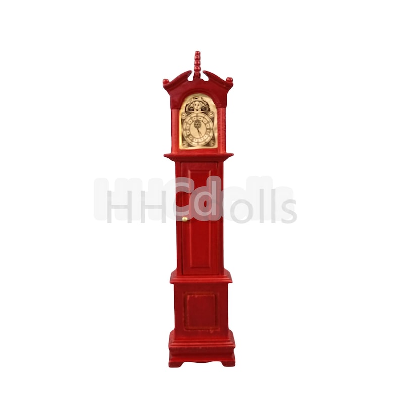 May include: A red wooden grandfather clock with a gold face and hands. The clock has a small door on the front and a decorative top.