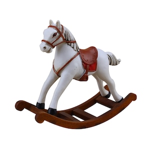 May include: White rocking horse toy with a brown saddle and a red accent. The horse is on a wooden rocking base.