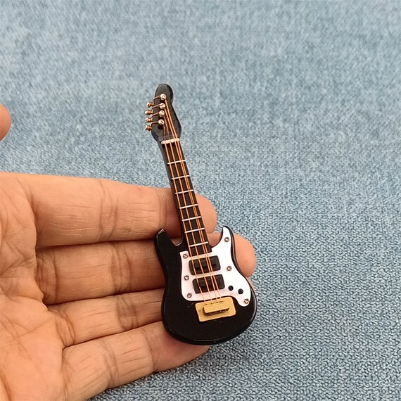 Modèle de Guitare Électrique Miniature, Modèle de Guitare Électrique Miniature V, Design Futuriste Modèle de Guitare Électrique Miniature, Modèle de Guitare Électrique Miniature V, Design Futuriste