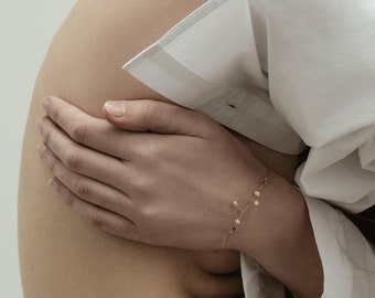 Bangle Bracelet | Gold wire and freshwater Pearls, cute and elegant bespoke jewellery.