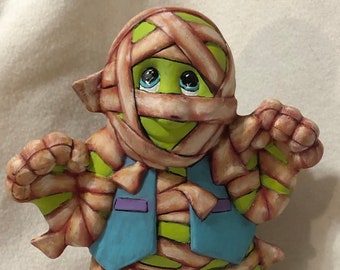 Ceramic dry brushed Clay Magic Mummy using Mayco Softee Stains