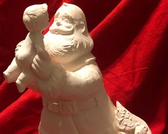 Ceramic Tradition American Santa Claus holding a child in bisque ready to paint by jmdceramicsart