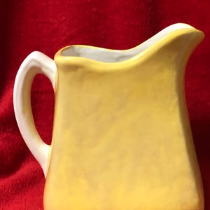 Rare Old Fashioned Ceramic Buttermilk Jug Glazed with Yellow Sunflower and a Milk Glass Glazed Handle