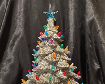 Doc Holiday glazed ceramic ornament Christmas Tree and base with multicolor bulbs and blue iridescent star by jmdceramicsart