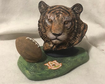 Auburn Tigers with football and base