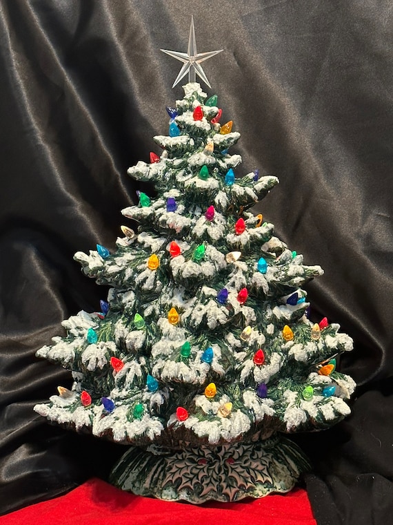 Snow-dusted Christmas Tree With Multicolor Bulbs & Plastic