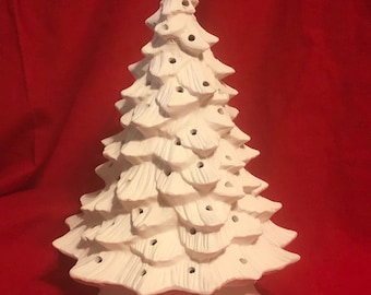 Small Doc Holliday Christmas Tree in ceramic bisque with holes for bulbs and lights